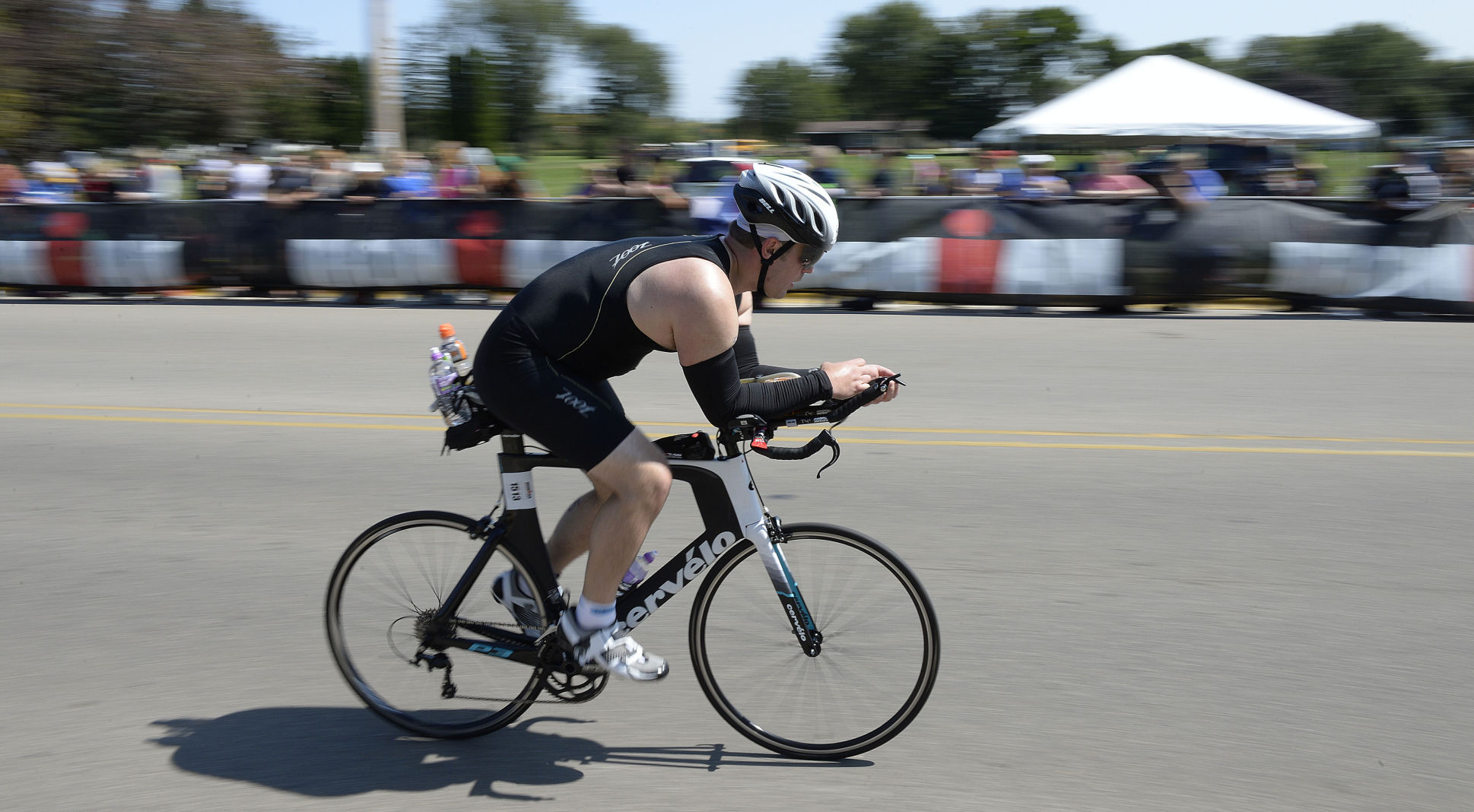 Spectators cheer on IRONMAN athletes